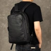 Leather travel backpack with large capacity, men's top layer cowhide backpack, retro casual men's business computer bag trend Application Scenario